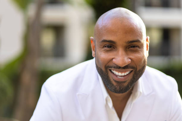 istock Attractive Black Doctor Smiling Outdoors 1362449811