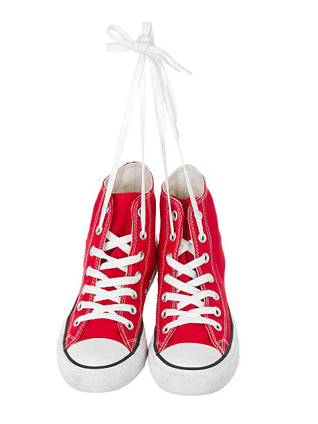 istock Vintage hanging red shoes 136245468