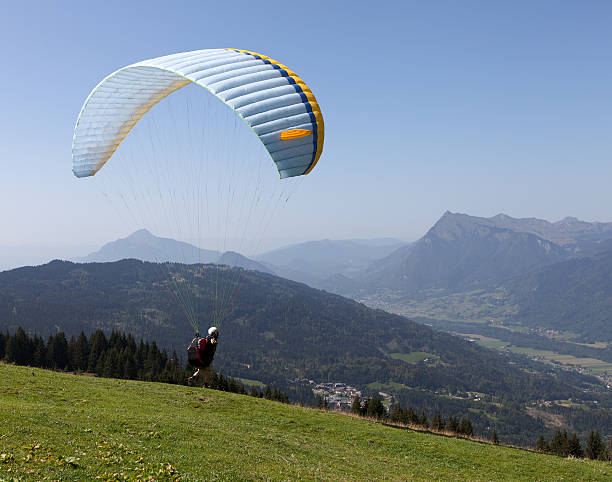 istock Paraglider launching above Samoens, France 136245582