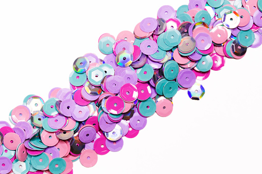 Colorful Sequins On White Background