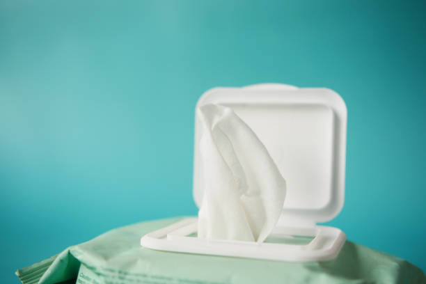 istock Cleansing wet wipes on table with copy space 1362458936