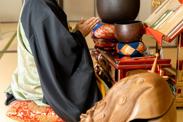 istock Image material of a monk praying at a Buddhist altar 1362461366