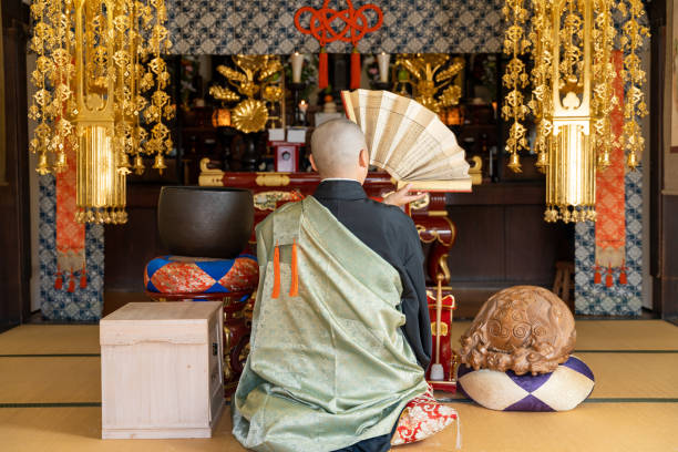 istock Image material of a monk praying at a Buddhist altar 1362461522
