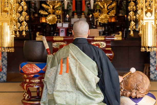 istock Image material of a monk praying at a Buddhist altar 1362461547