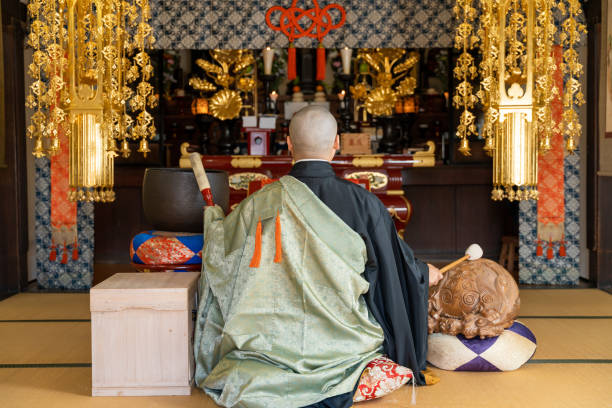 istock Image material of a monk praying at a Buddhist altar 1362461551
