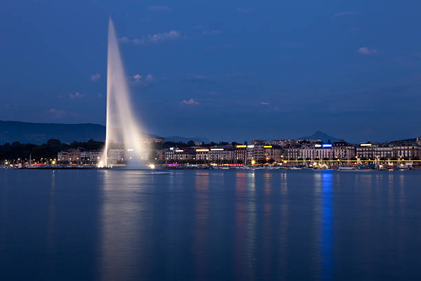 istock Lake Geneva fountain by night 136246203