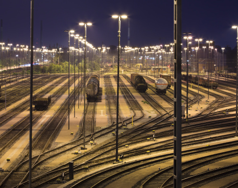 View over a waggon switching yard in the Hamburg harbour. Nice nightshot of an industrial landscape