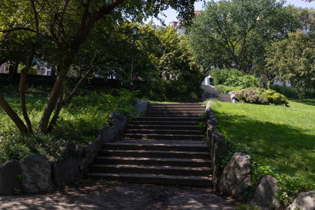 istock Empty Stairs with Green Trees and Plants at Morningside Park during the Summer in Morningside Heights of New York City 1362470748