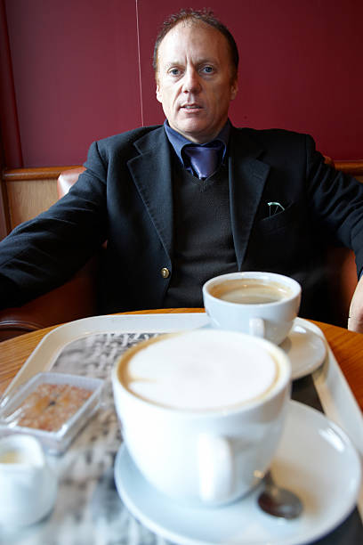 istock Suave middle aged business man with coffee 136247693
