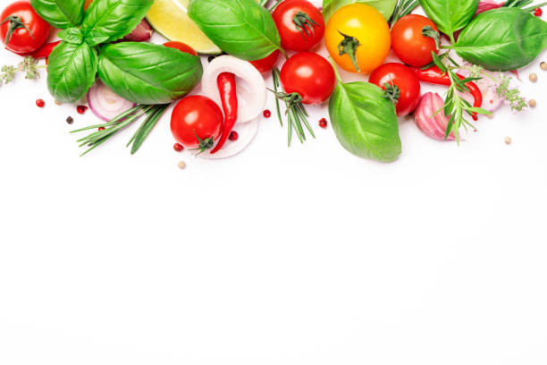 istock Spices, spicy herbs and vegetables. Tomato, basil, pepper, garlic, onion, thyme, lime on white background. Cooking concept, top view, copy space 1362477247