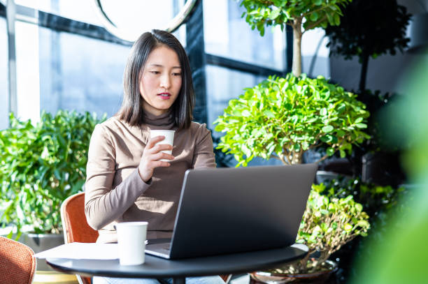 istock Young asian woman working in office 1362485807