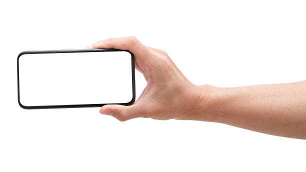 istock Male hand holding phone isolated on white background. 1362489538