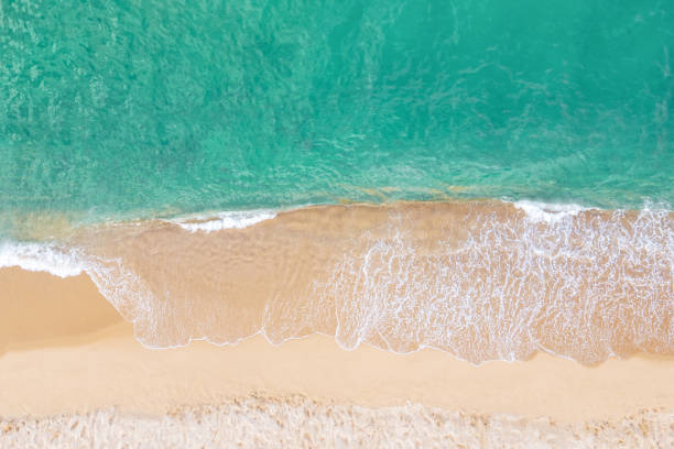 istock A ocean waves and beach aerial view, natural background. 1362489822