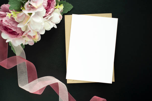 istock Bouquet and card in the black background. Mock-up 1362495216