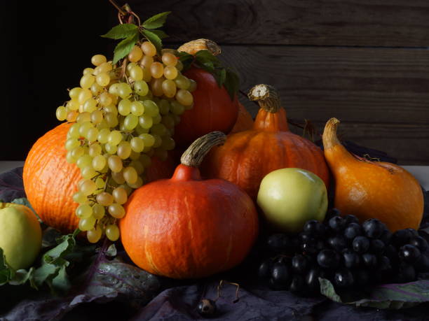 istock Still life of pumpkins, grapes and apples 1362501295