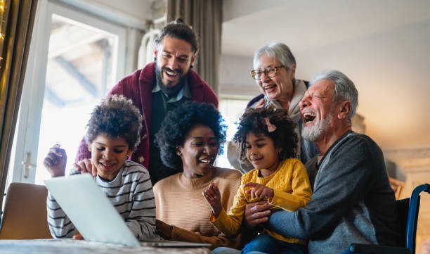 portrait of a happy multigenerational multiethnic family at home. - 多代家庭 圖片 個照片及圖片檔