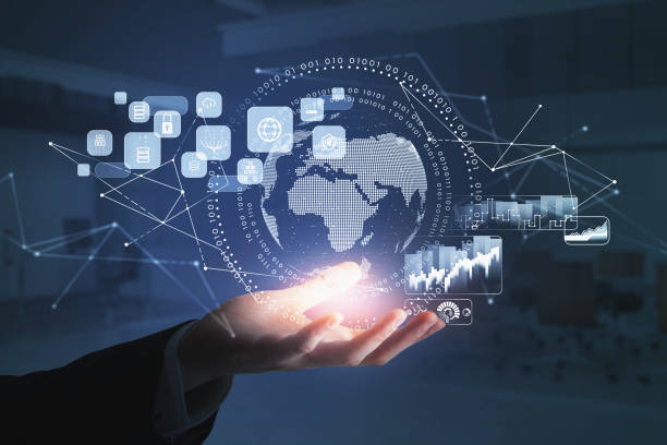 istock Businessman wearing formal suit is holding digital interface with globe 1362511999
