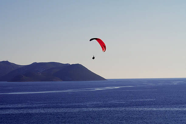 istock Paraglider above the Mediterranean Sea 136251216