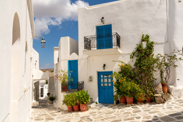 White houses with blue shutters in Lefkes, Paros, Greece stock photo