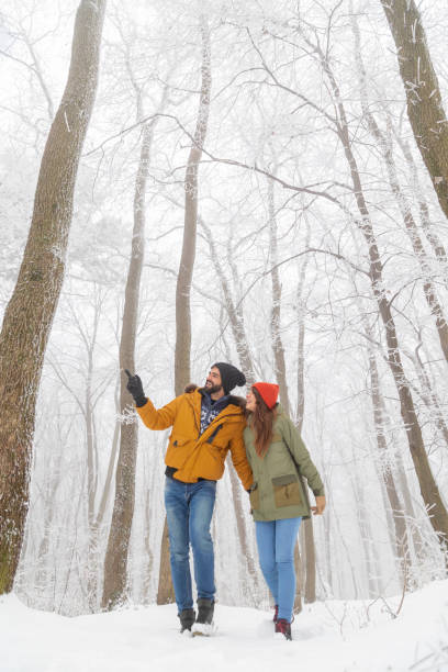 istock Couple walking in the snow 1362514924