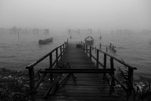 Black and White of a characteristic pier in the Sacca di Scardovari in the municipality of Porto Tolle