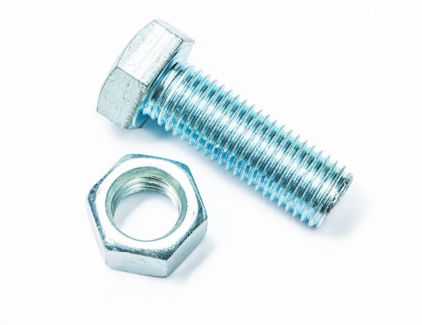 istock metalic bolt with nut isolated on  white background 1362515848