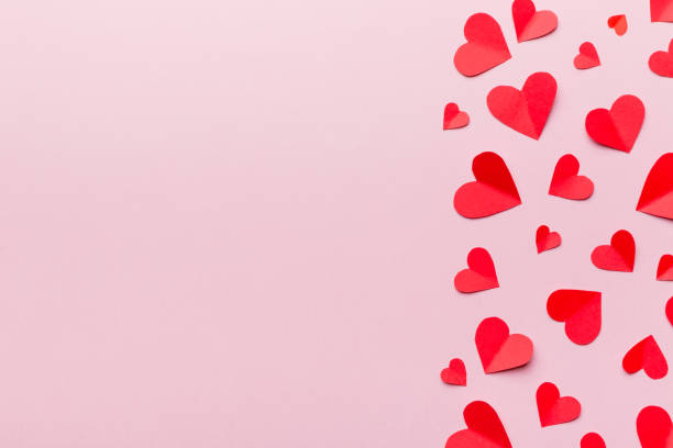 istock Valentine day background with red hearts, top view with copy space 1362517577
