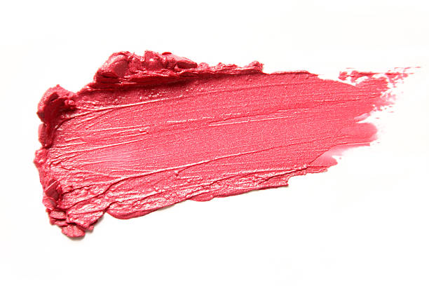 istock Coral lipstick smear on white background 136251774