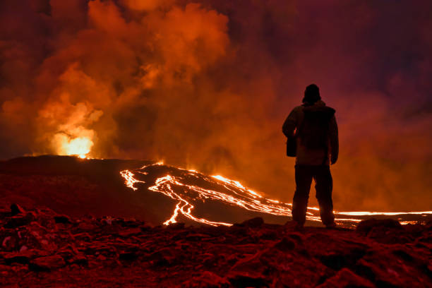 flowing lava at fagradalsfjal volcano in iceland - hofmann imagens e fotografias de stock