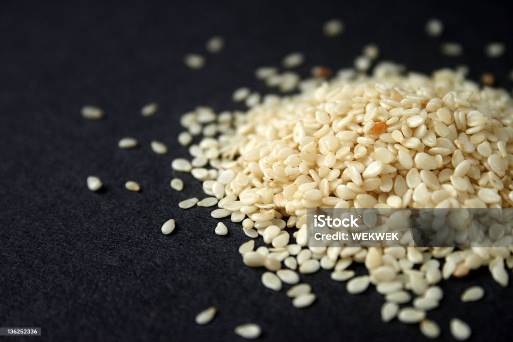 White Sesame on Black Background White Sesame on Black Background. Black Color Stock Photo