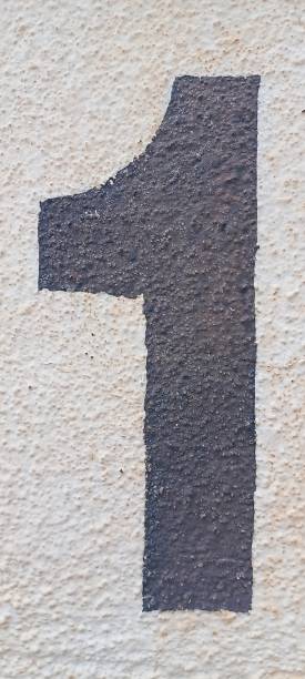 istock number one painted stencil on wall, number one, number 1 1362523406