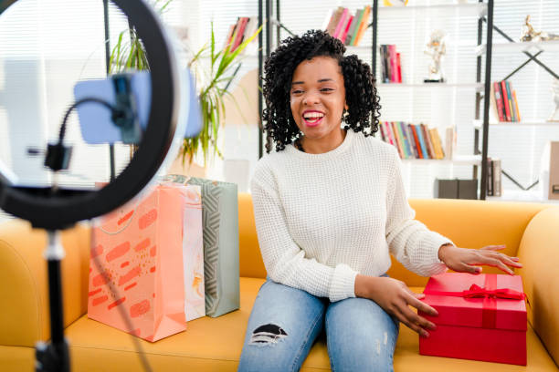 istock Smiling African influencer doing a vlog post in her living room 1362526442