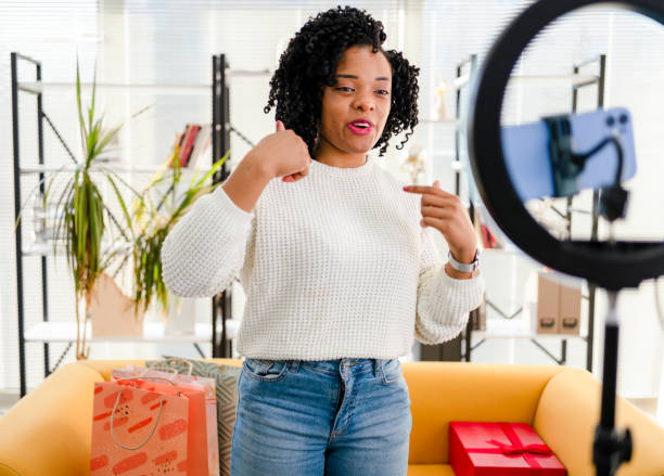 istock Smiling African influencer doing a vlog post in her living room 1362526483