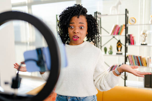 istock Smiling African influencer doing a vlog post in her living room 1362526567