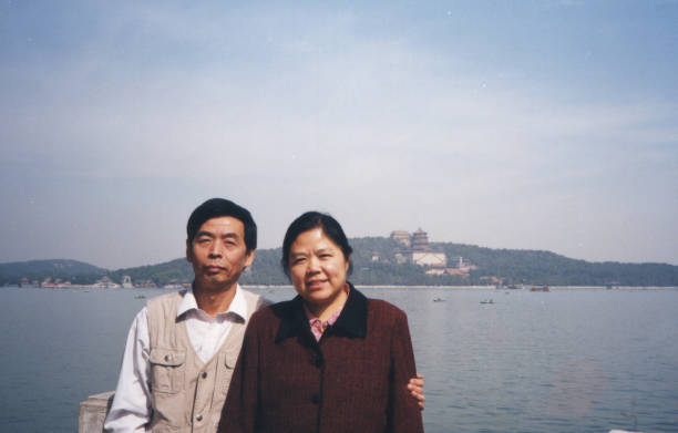 2000s Chines Mature Couple Photo of Real Life 2000s Chines Mature Couple ​Photo of Real Lif lakeshore photos stock pictures, royalty-free photos & images