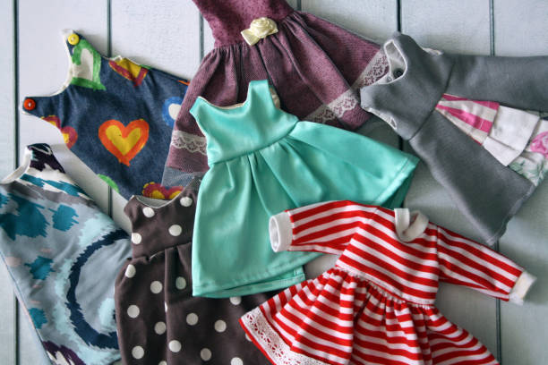 istock Textile doll dresses. DIY clothes for a doll. 1362527380