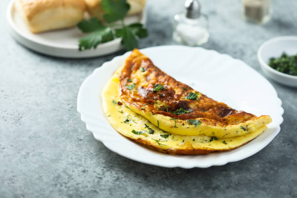 Omelette with herbs Traditional homemade omelette with herbs frittata stock pictures, royalty-free photos & images