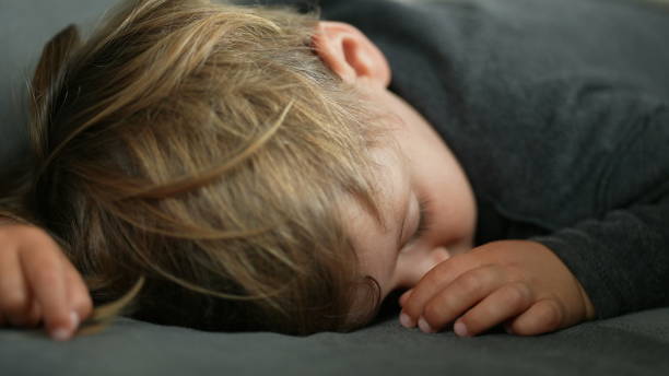 istock Baby boy sleeping, close-up child asleep napping 1362529291