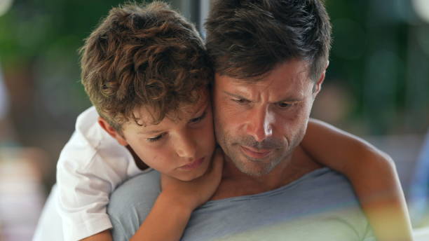 istock Candid father and child together, kid embracing dad 1362530238