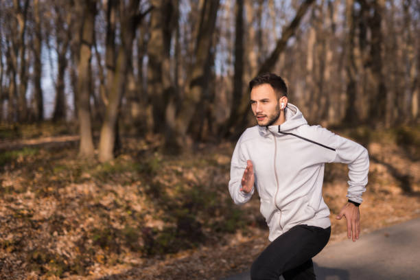 istock Young sportsman running in nature. 1362531421