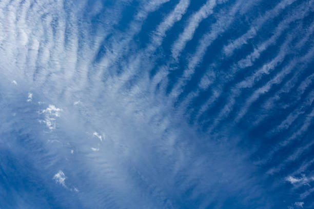 Cirrus and Stratus clouds in dramatic blue sky over Cape Town South Africa