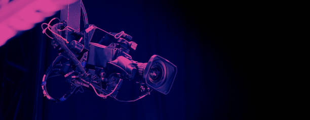 istock TV Camera broadcast on the crane tripod for shooting or recording and broadcasting content in studio production to on air tv or online internet live show. HD Video recording on crane. Selective focus. 1362540290