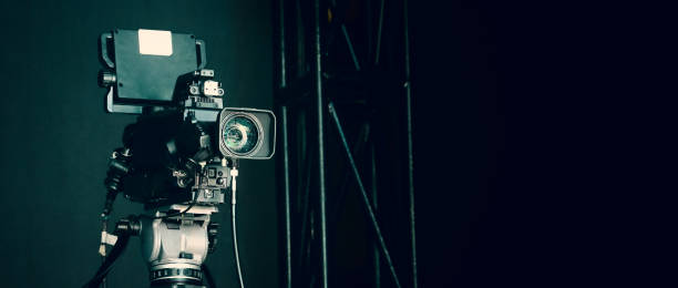 istock TV Camera broadcast on the crane tripod for shooting or recording and broadcasting content in studio production to on air tv or online internet live show. HD Video recording on crane. Selective focus. 1362540292