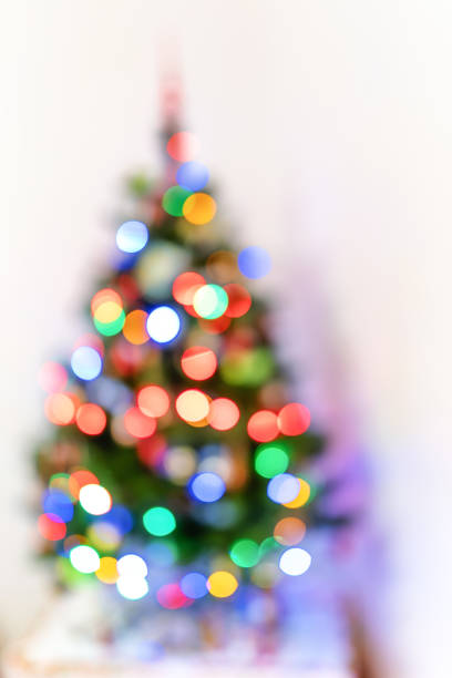 istock blur light colorful bokeh celebration and defocused lights decoration on christmas tree 1362546515