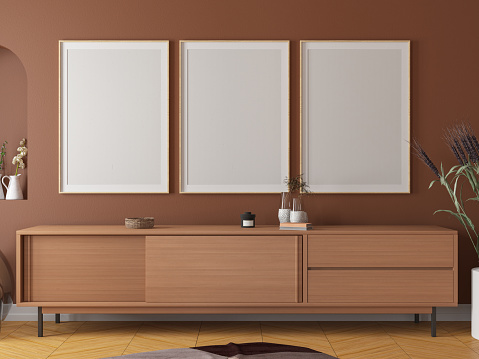 Sideboard and three blank photo frame for mockup. 3D Render