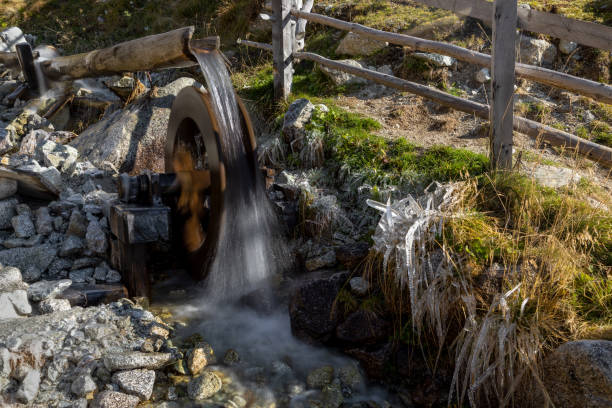 Water wheel at a hiking path on Meran 2000, South Tyrol