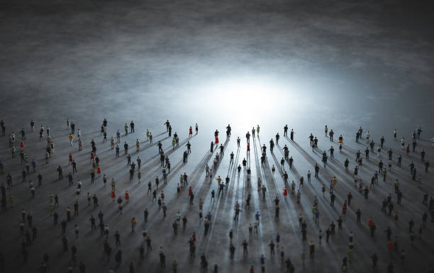 istock Crowd of diverse people walk to light. 1362550350