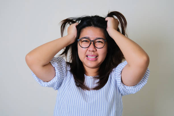 istock Adult Asian woman showing stressed face expression 1362551780