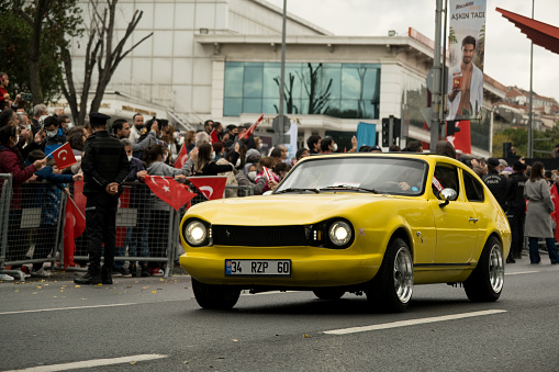 Istanbul, Turkey - October 29, 2021: Side view of a Anadol STC-16 yellow car which produced in 1973. Editorial Shot in Istanbul Turkey.