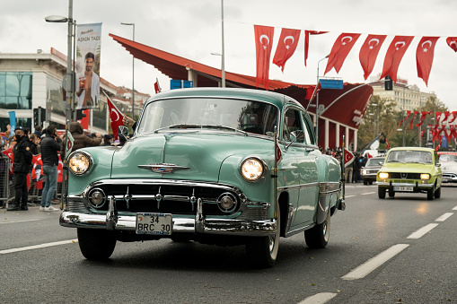 Istanbul, Turkey - October 29, 2021: Front view of a green 1952 Chevrolet Deluxe on October 29 republic day of Turkey, Classic car parade moment.